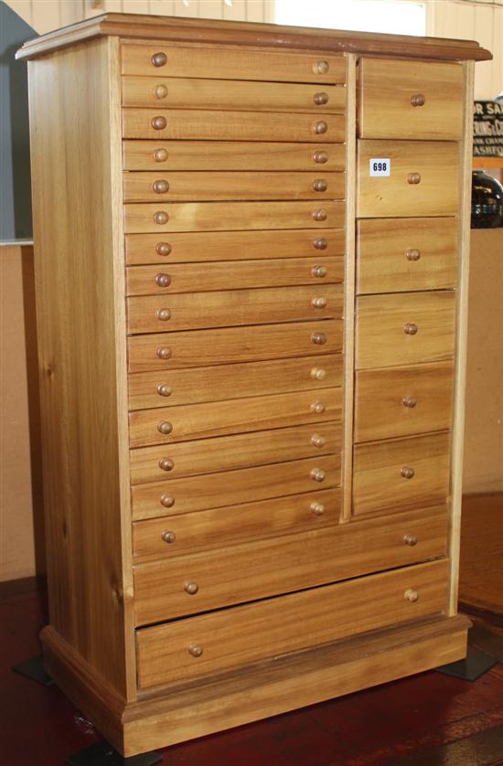 Light oak collectors cabinet, 22 drawers